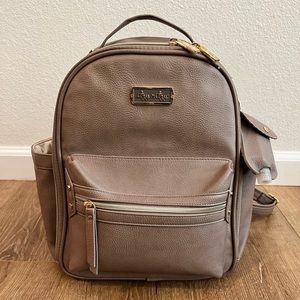 Itzy Ritzy “Itzy Mini” diaper bag in taupe color